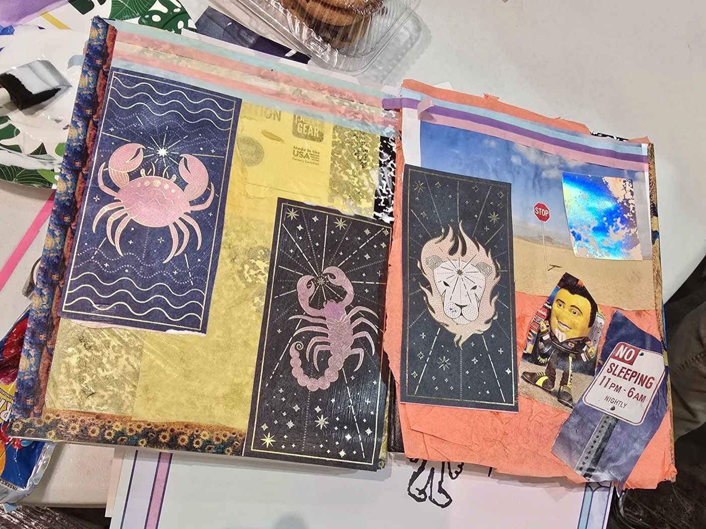 A journal spread full of zodiac signs and keepsakes.
