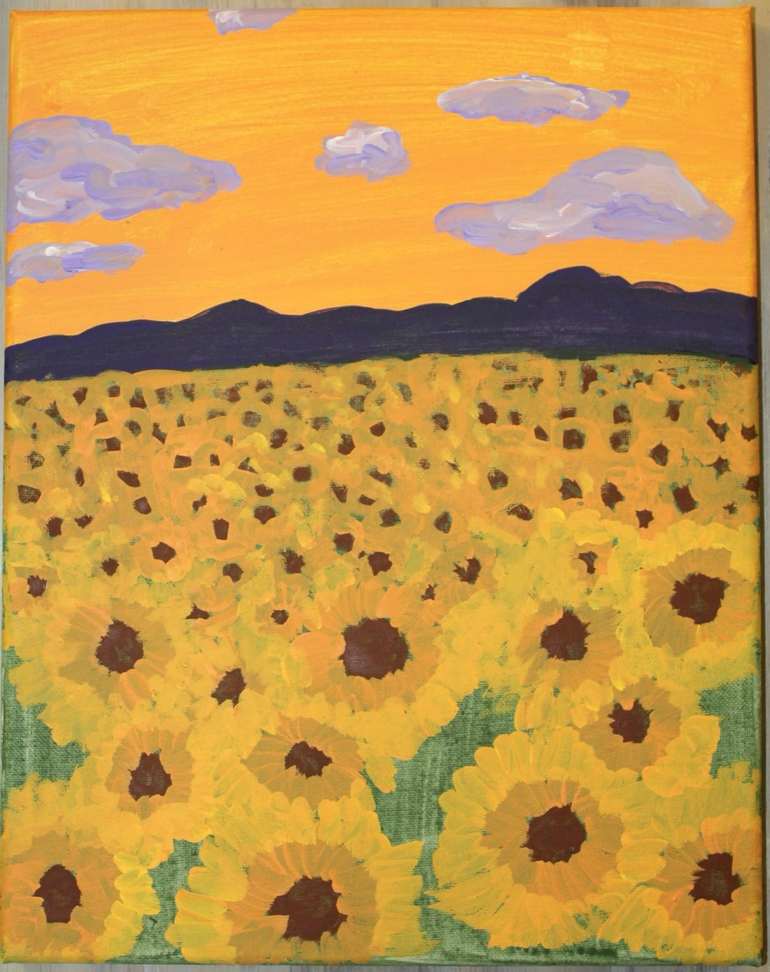 An acrylic painting of a sunflower field at sunset.